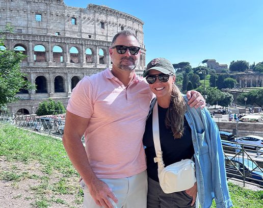 Derek with wife on vacation